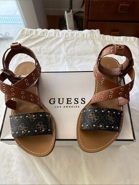 NWOT GUESS Cevie Brown and Black Logo Studded Cross-Strap Gladiator Sandals